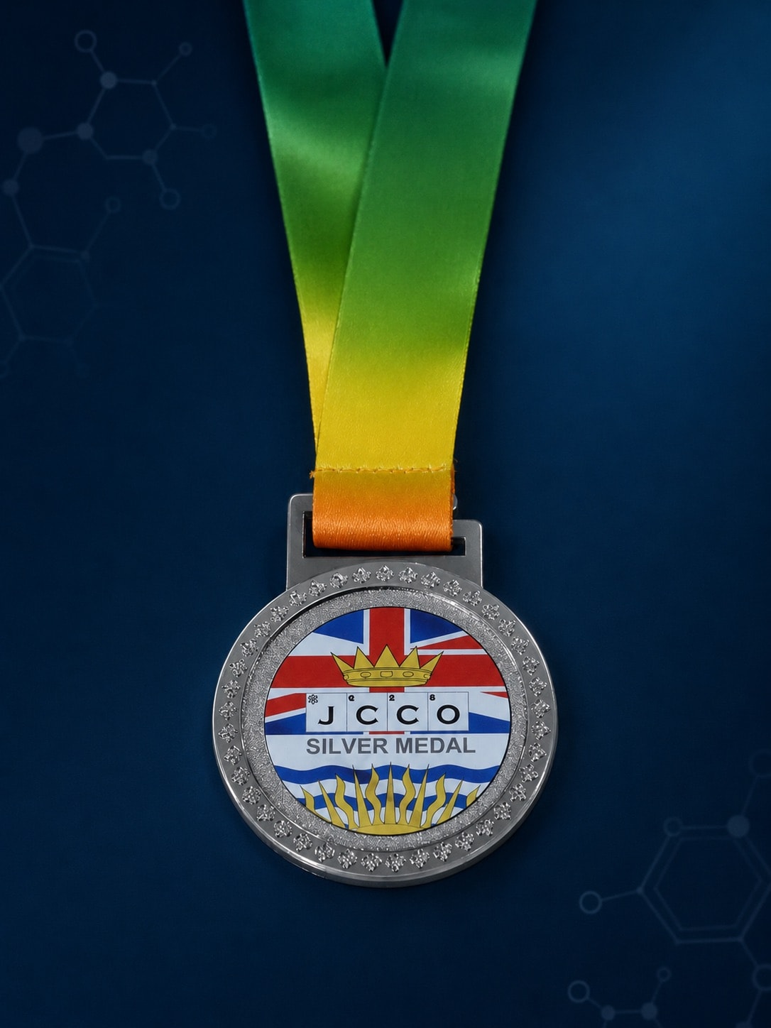 เหรียญเงิน JCCO ด้านหน้าพร้อมริบบิ้น